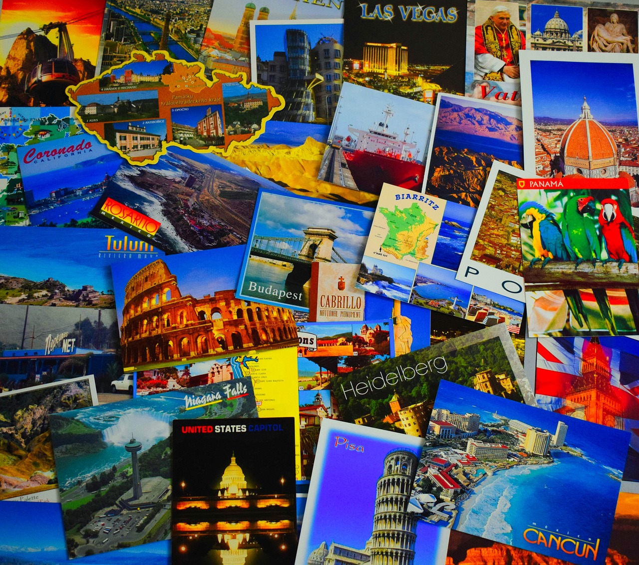 An array of scattered postcards.